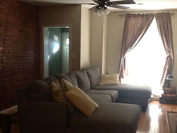 Large living room with huge windows and beautiful light