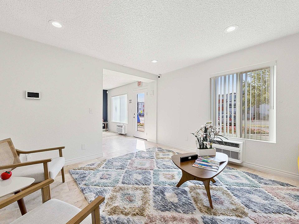 Experience the warmth and comfort of this sunlit modern living space.