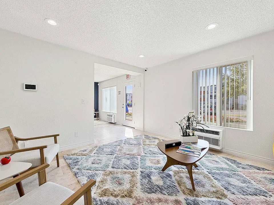 Experience the warmth and comfort of this sunlit modern living space.