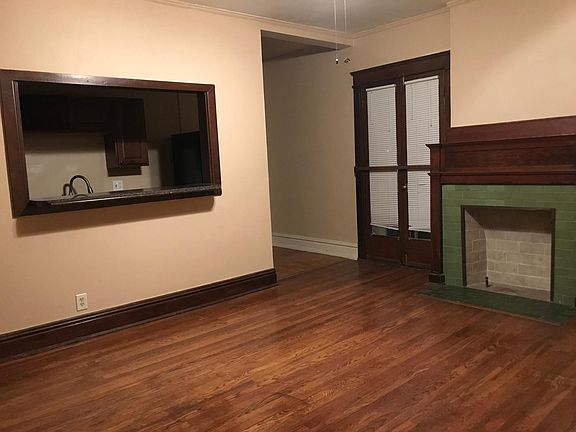 Built-in bar separating kitchen and living room.