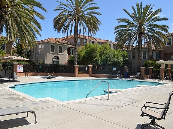 Pool and Jacuzzi and kids play area (adjacent to the pool).