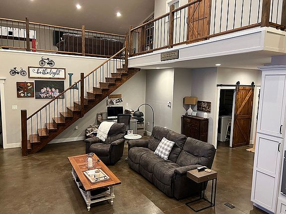 Open concept LR with loft