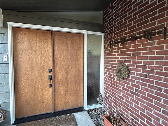 Covered Front Entry with double doors.