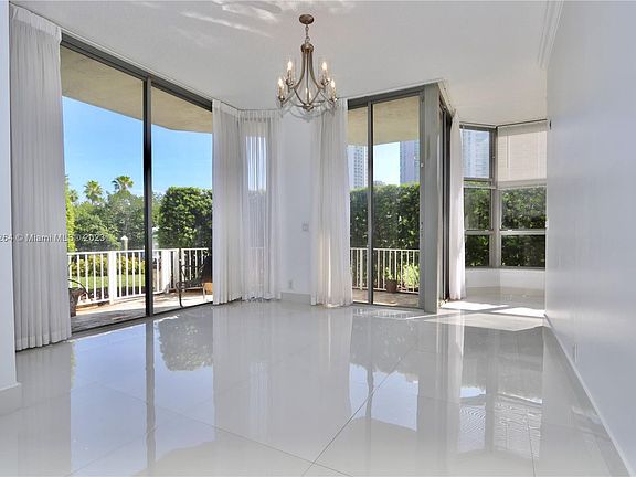 5th image of 3500 Mystic Pointe Dr APT 105