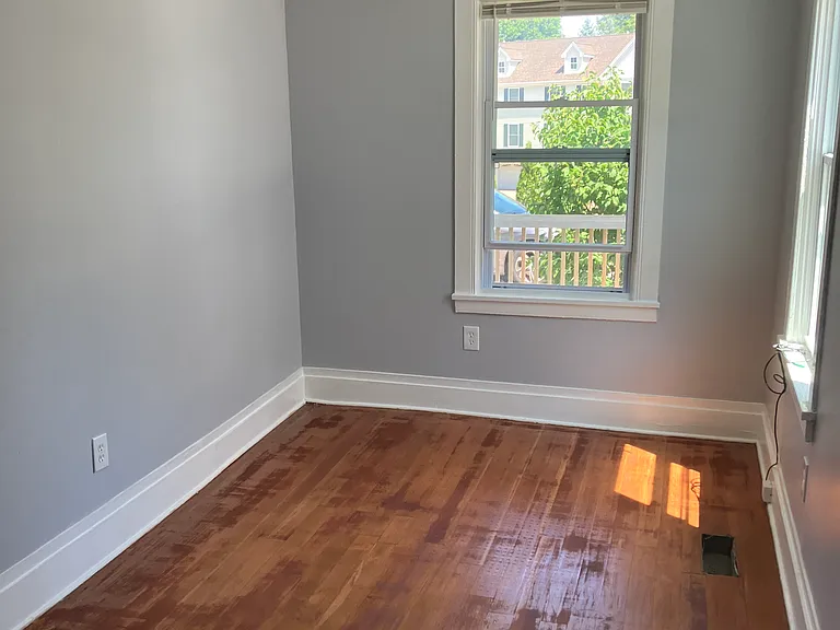 Bedroom #2 with windows on both sides.