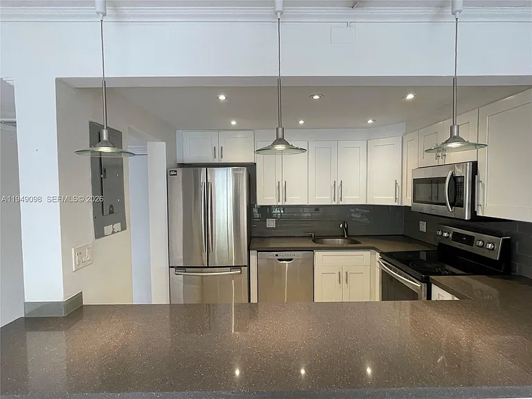 1650 NE 115th St #311 — Photo 15