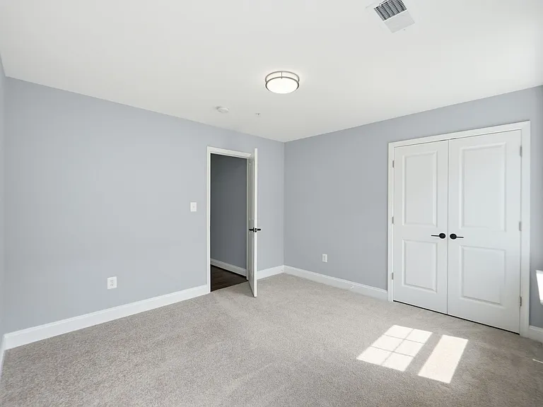 Two of three large upstairs bedrooms with closet (in addition to upstairs master).