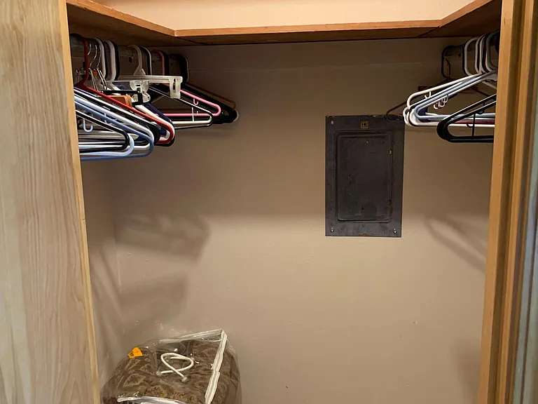 Walk in closet in primary bedroom