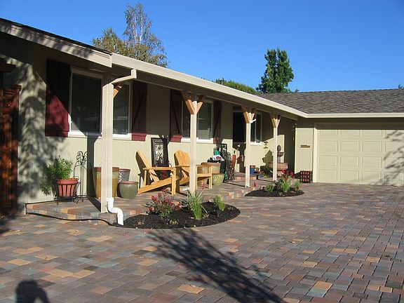 Driveway to garage and porch