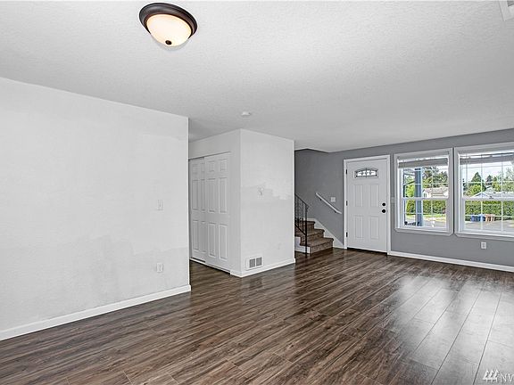 View of Front Door and Stairs from the Formal Living Area