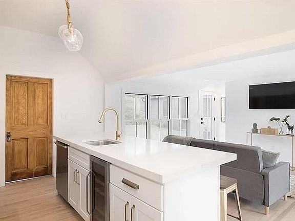 Spacious and bright open floor plan living, kitchen.