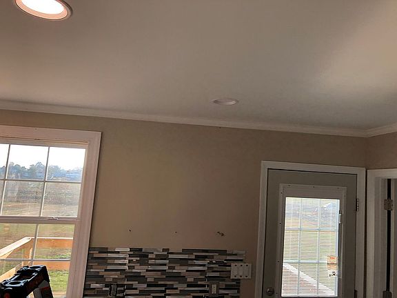 Rebuilt back wall, new door 