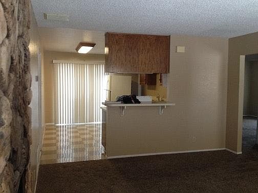 Dining area, kitchen to right.
