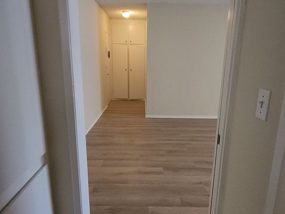 Bathroom hall to living room and front door