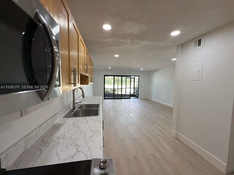 9001 Jacaranda Ln #107 — Photo 4