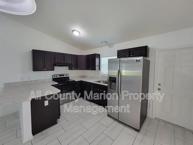 6374 NW 62nd Pl — Photo 3