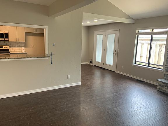 Living room, dining, out toward patio