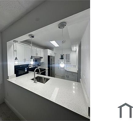 1st image of 901 NE 209th Ter #105-26
