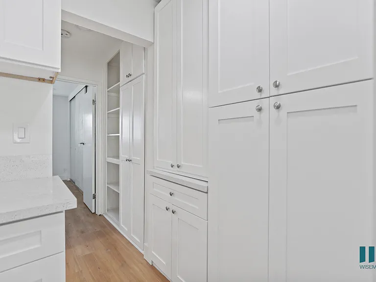 Ample Kitchen and Hallway Cabinet Storage