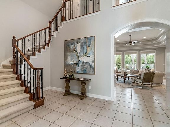 What an elegant open entrance to this exquisite home.