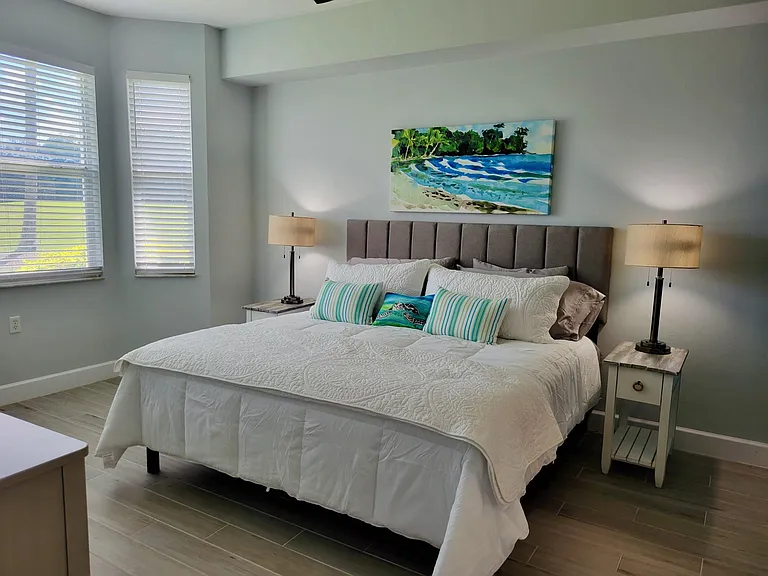 Master bedroom w/view of golf-course
