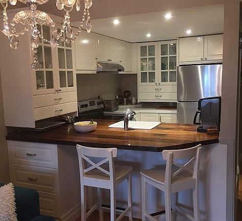 Kitchen with lots of storage and breakfast bar.