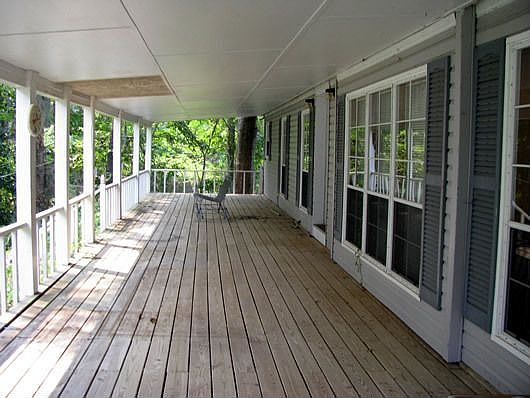 covered porch overlooking lake