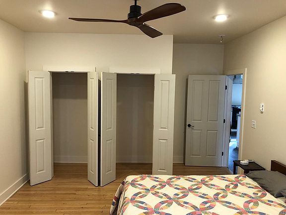 Large closets with louverd doors