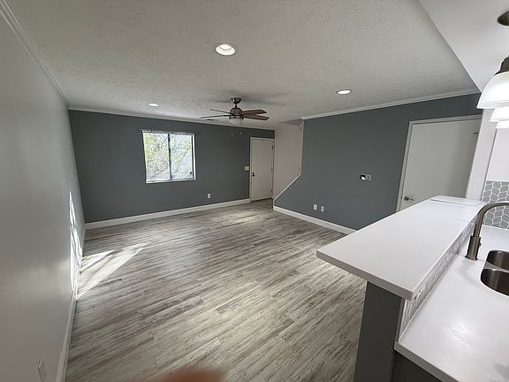 Living space ; door in back right corner opens to outside