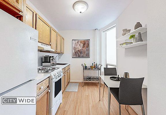 3rd image of 21 E 2nd St APT 27
