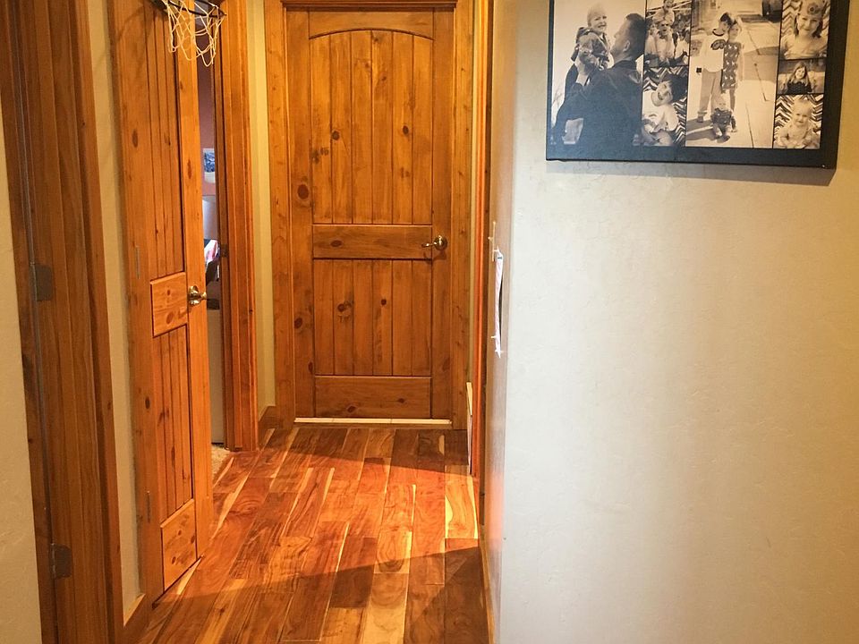Entry hall from Front door. bedrooms on left, laundry at end