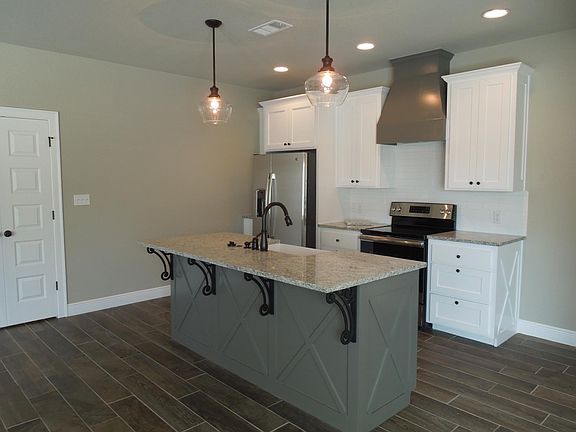 kitchen area with counter on center island