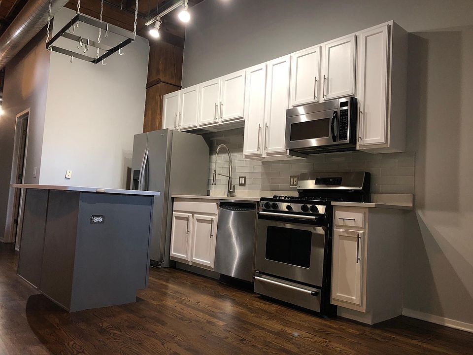 New: Quartz Countertops / Grohe Kitchen Faucet / Glass Tile Backsplash/ Hardware for Kitchen Cabinets/ S.S Appliances: Dishwasher / Gas Oven Stovetop / Microwave Whirlpool Refrigerator (Recently Purchased)