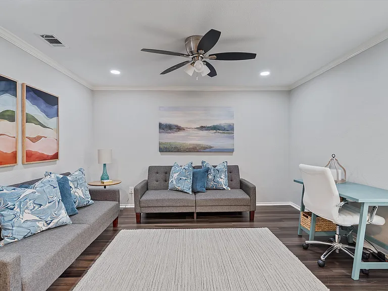Secondary Living Room with 2 Fold Down Couches for Extra Beds if needed. Workspace with Office Chair. Wireless Printer Included