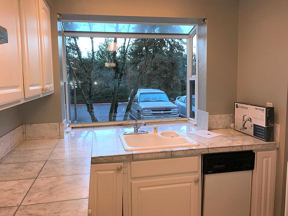 Kitchen with Bay window. New blinds and New Faucet to be ins