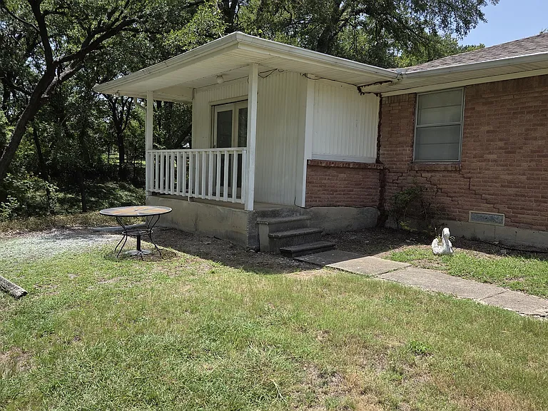 The room has its own large porch/patio which provides a separate private entrance..