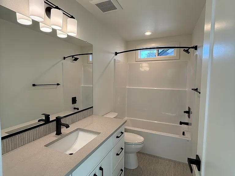 Second primary suite bathroom.