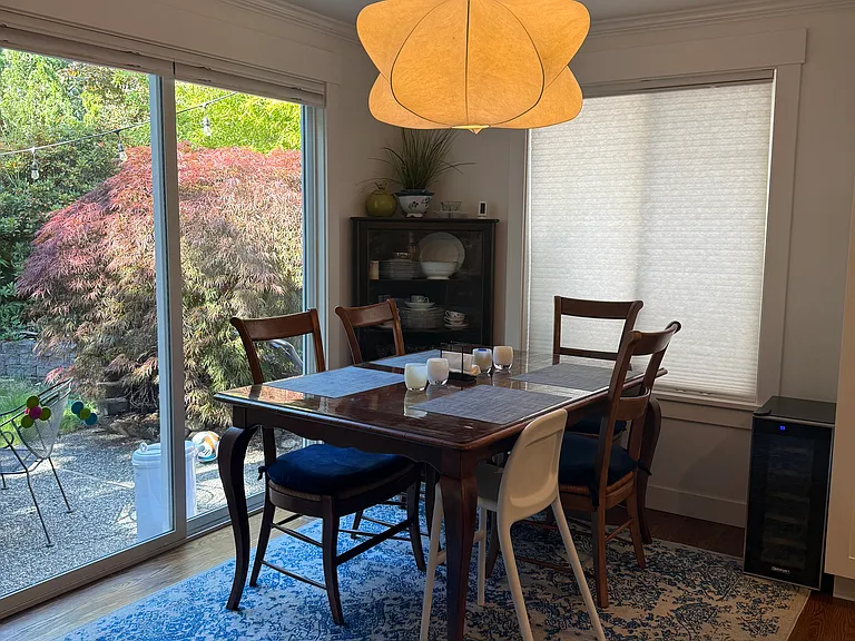 Dining Room off of the open Kitchen that leads to the backyard.
