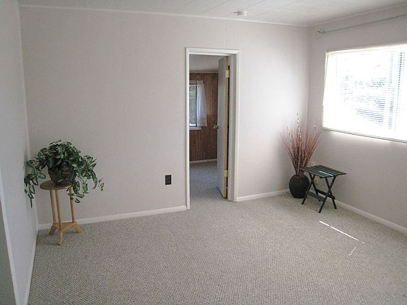 Front room-new carpet here and throughout home