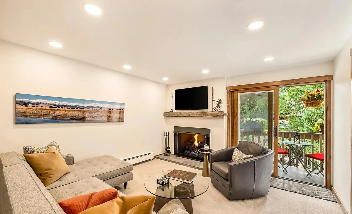 Balcony looks down on pool and up to Vail Mountain Ski-run Views - 1040 Vail View Dr