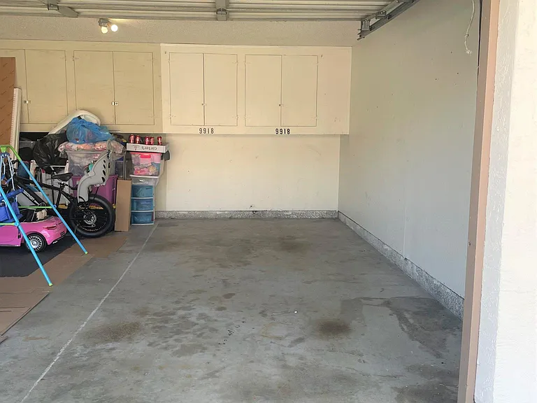 Extra storage cabinets in garage! Garage is SHARED with neighbor.
