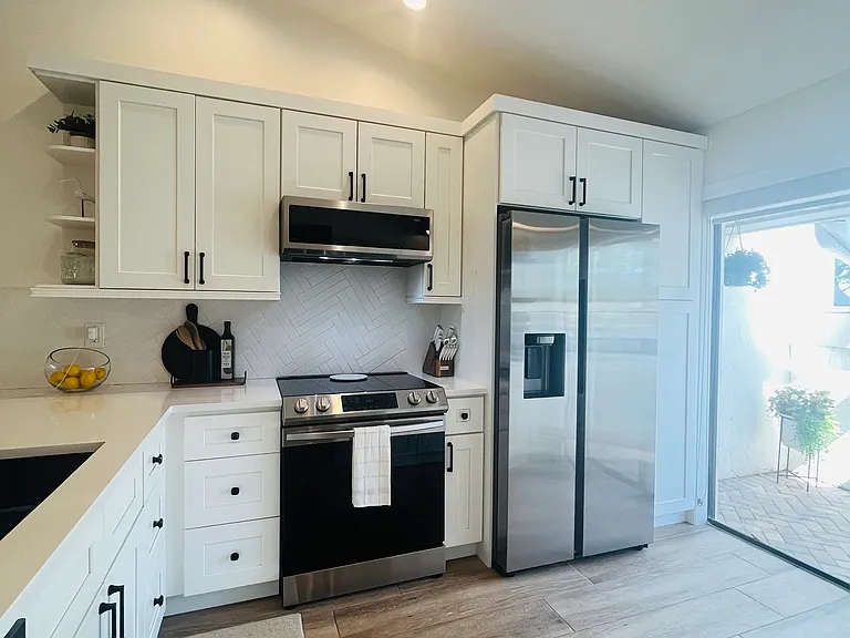 Kitchen, SS appliance, LED lights, pantry, and sliding doors out to your front patio.