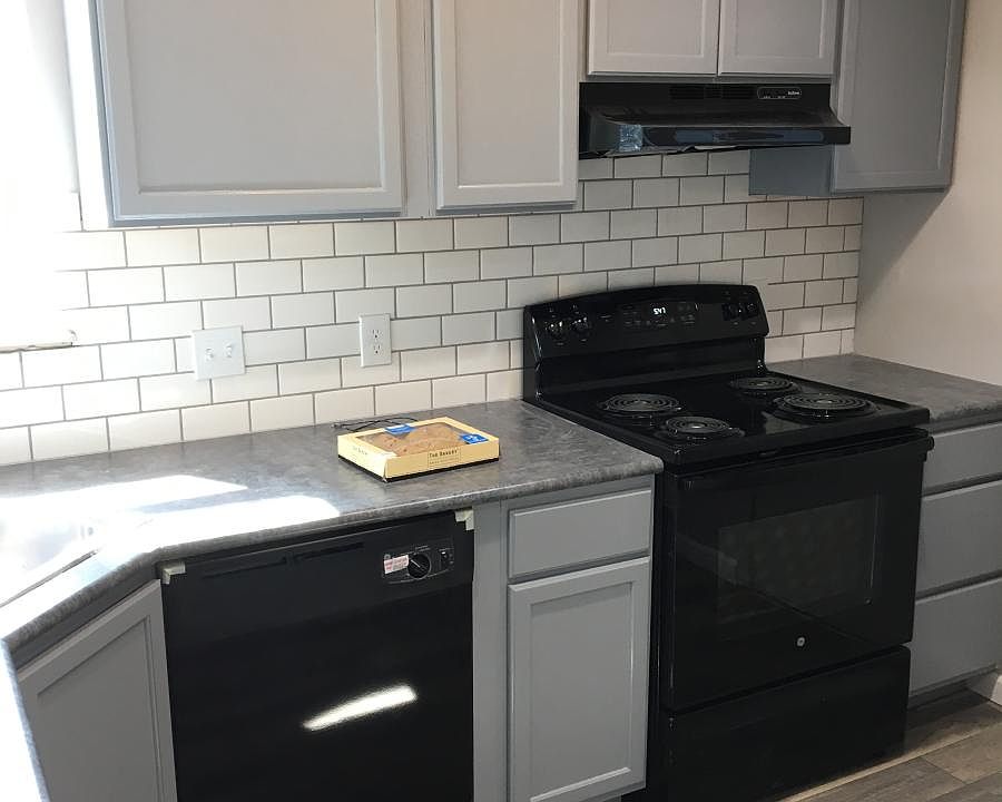 Kitchen-new counters,cabinets,lighting,sunk,flooring,backspl