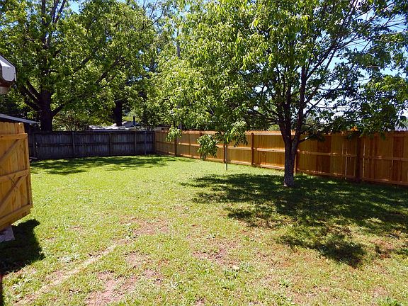 new fenced in back yard