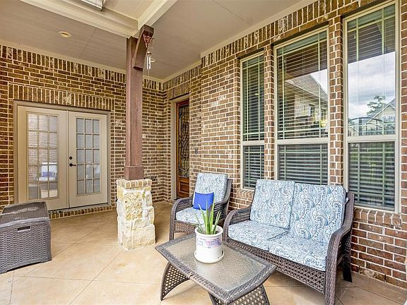 Once inside, the actual courtyard awaits. The French Doors lead to the "in-law suite."