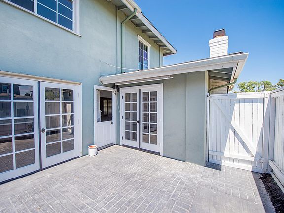 PRIVATE PATIO. With (2) Double French Doors to the Kitchen and Living Room. Plus Half-Door Access :)