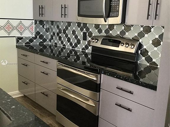 4th image of 4949 White Mangrove Way W #106-1