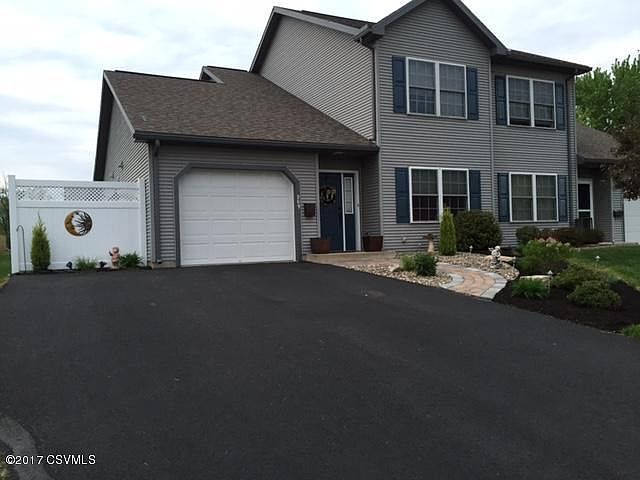 Gorgeous townhouse with paved driveway