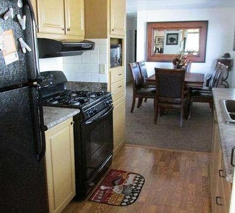 upgraded kitchen appliances, counter tops, flooring