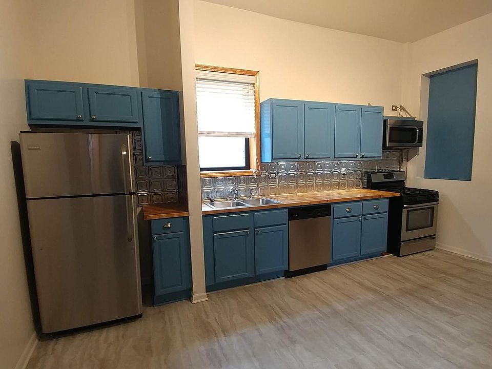 Huge eat-in kitchen with large pantry closet.